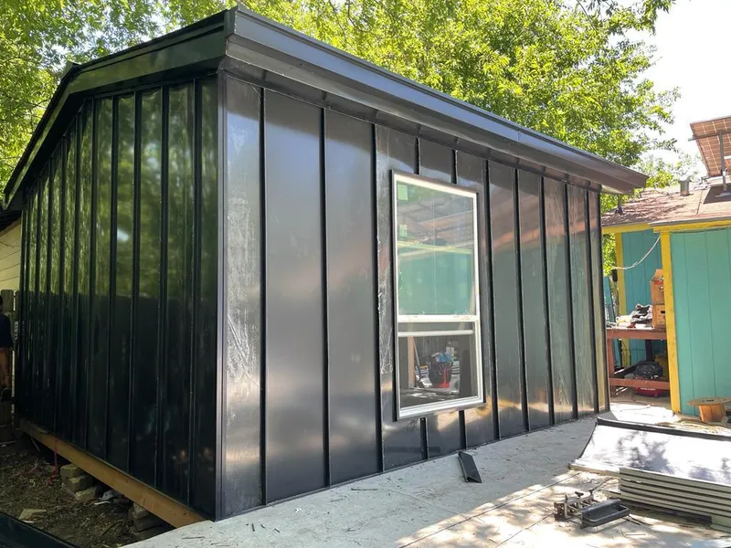 Black standing seam metal wall panels for Metal Roof Installation in West Point